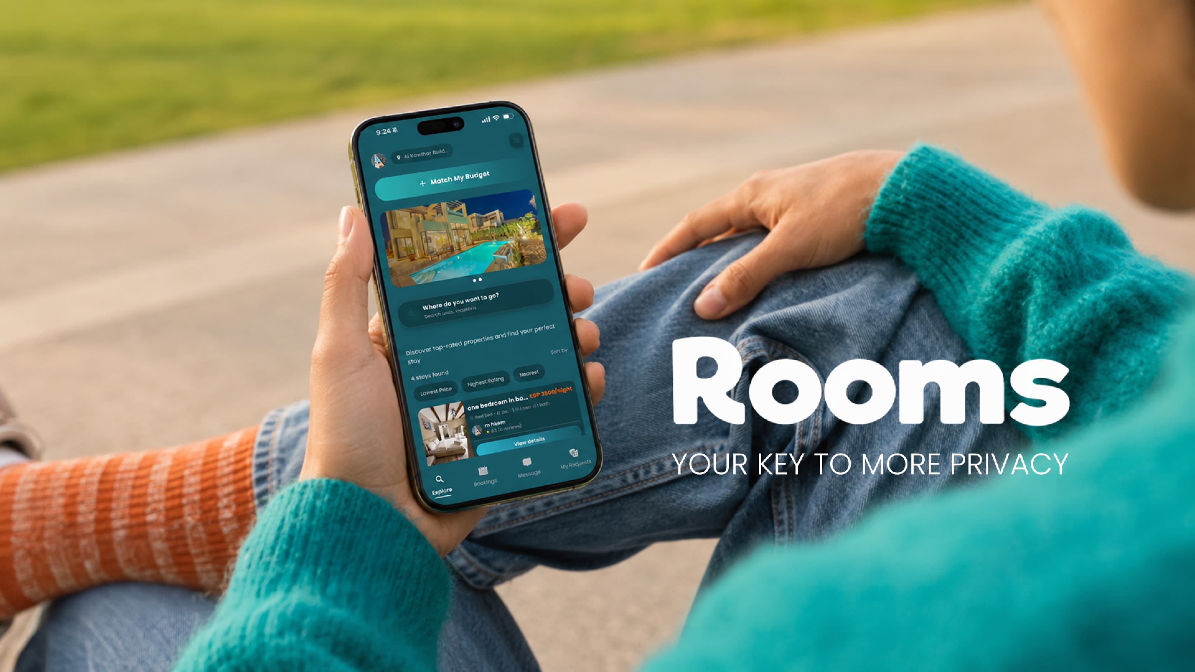 Hands holding a phone open on the Rooms app — your key to more privacy